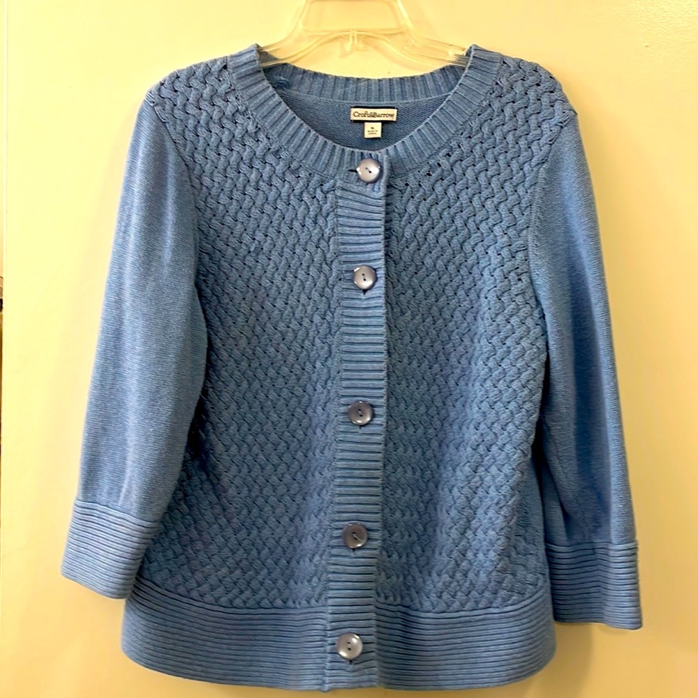 Basket weave, waist length cardigan sweater.